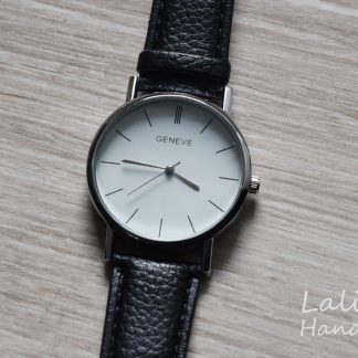 Elegancki i minimalistyczny zegarek na pasku na rękę. Zegarek jest pięknie wykonany. Ucieszy obdarowanego!