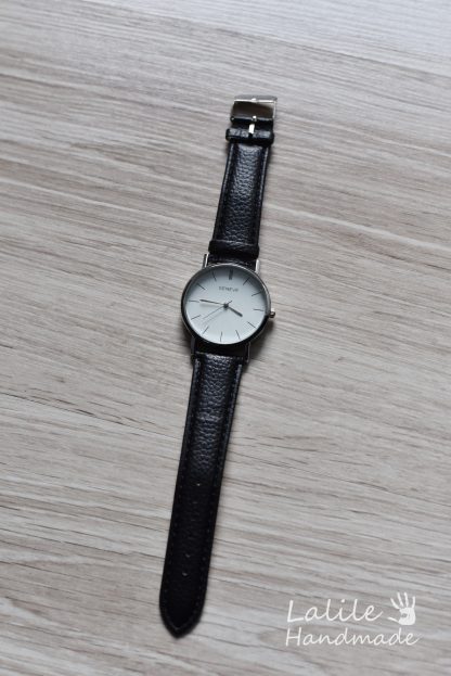 Elegancki i minimalistyczny zegarek na pasku na rękę. Zegarek jest pięknie wykonany. Ucieszy obdarowanego!